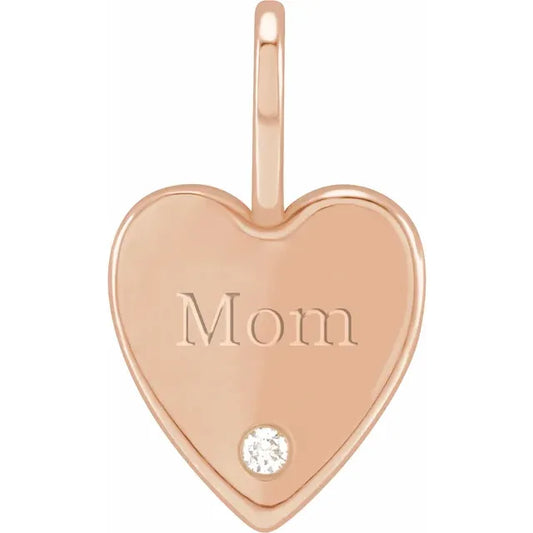 14 kt guld hjertevedhæng med indgravering "MOM" og ,025 ct. naturlig diamant