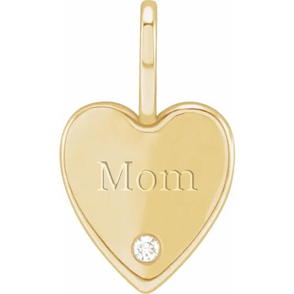 14 kt guld hjertevedhæng med indgravering "MOM" og ,025 ct. naturlig diamant